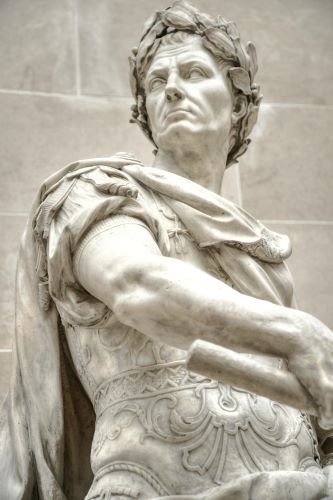 Photo by Skitterphoto via Pexels: https://www.pexels.com/photo/julius-caesar-marble-statue-615344/.